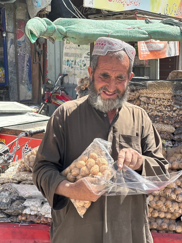 Morning street life documented in South Asian mountain town