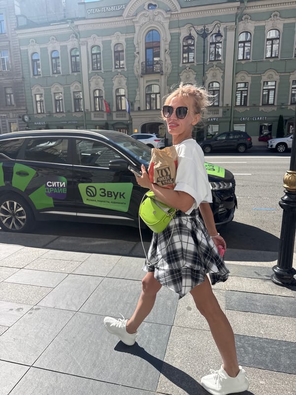 Sunny afternoon wandering Saint Petersburg's streets and storefronts