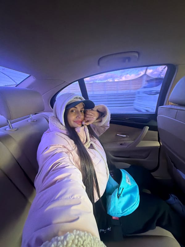 Woman rests in car on Saint Petersburg highway