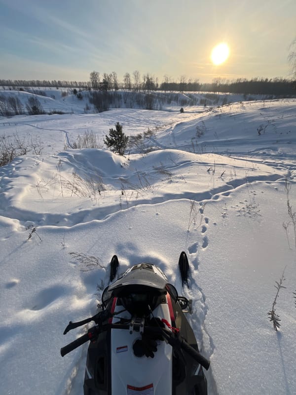 Snowmobiler captures sunny winter landscape in rural Russia