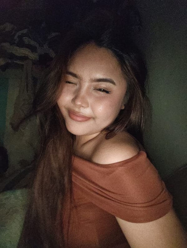 Playful indoor selfie from Davao City, Philippines