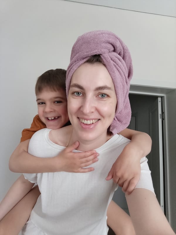 Morning routine captured in Russian household with woman, child, cat