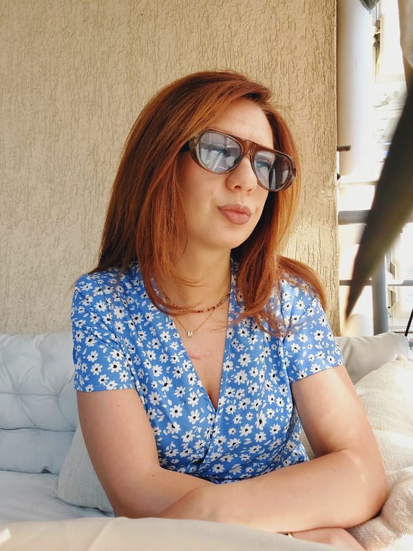 Morning on a Sofia balcony, blue floral dress and coffee.
