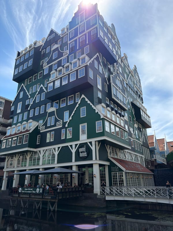 Zaandam's stacked-houses hotel and streets on a sunny afternoon