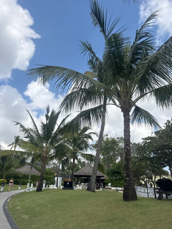Hospitality staff walk resort grounds in Kuta Selatan, Bali