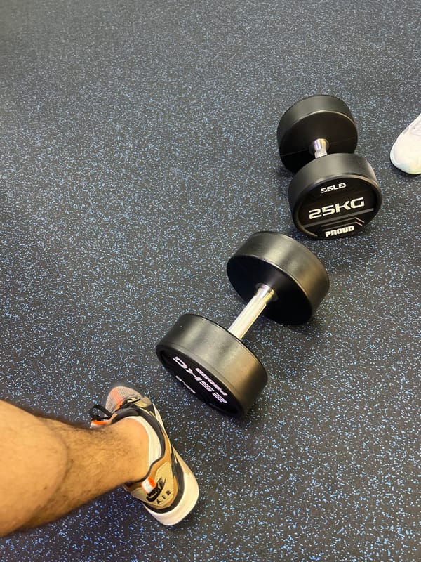 Person exercises with dumbbells at Burgas gym