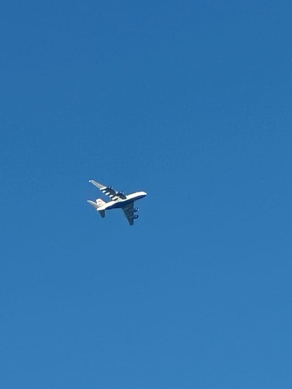 British Airways A380 climbs through clear skies over London