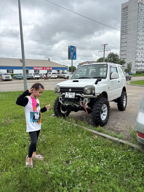 Residential streets in Blagoveshchensk, with a lifted Jimny and construction in view