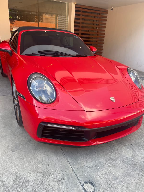 Red Porsche 911 spotted parked in Playa del Carmen
