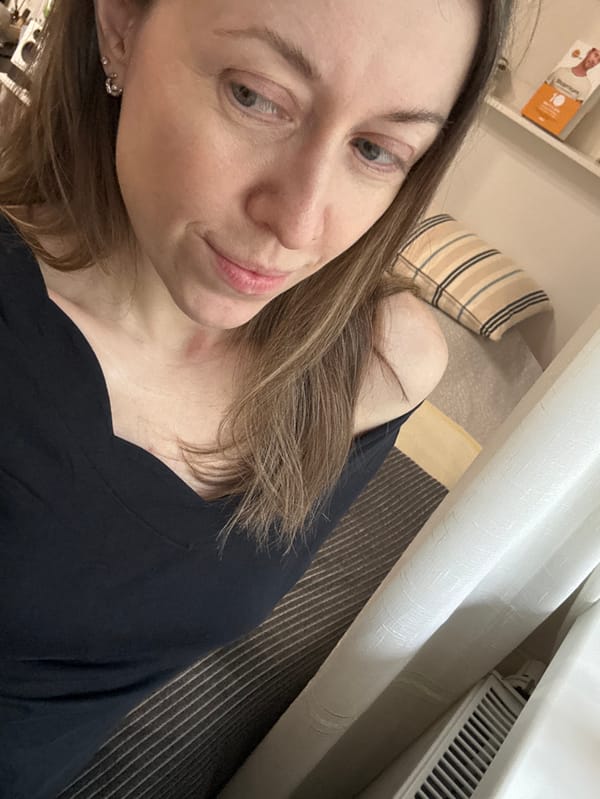 Woman photographed in residential setting in Kudrovo, Russia