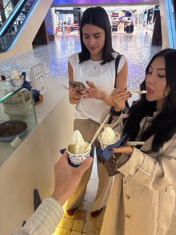 Two women sample gelato at Puebla shop Tuesday evening
