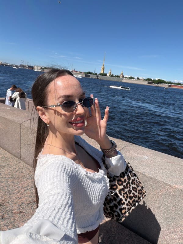 Saint Petersburg tourists enjoy sunny morning along Neva River