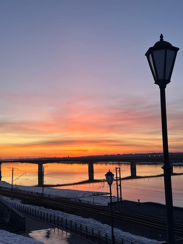 Sunset over Kama River bridge captured in Perm, Russia