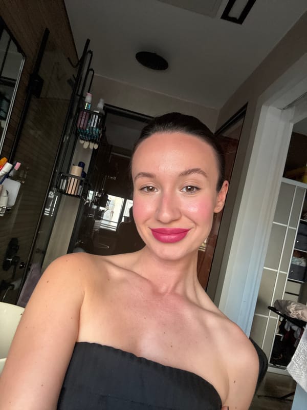Woman takes selfies indoors in Tel Aviv