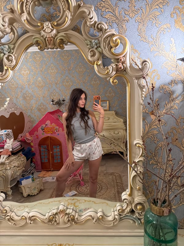 Mirror selfie in an ornately decorated room in Ufa