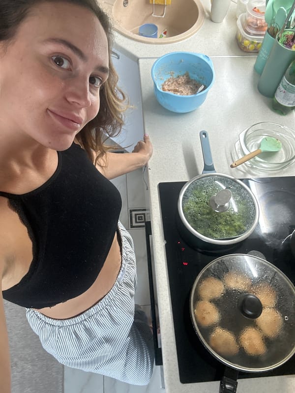 Woman cooking at home in kitchen in Surgut