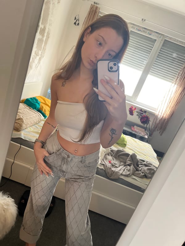 Woman takes mirror selfie in Varna, Bulgaria