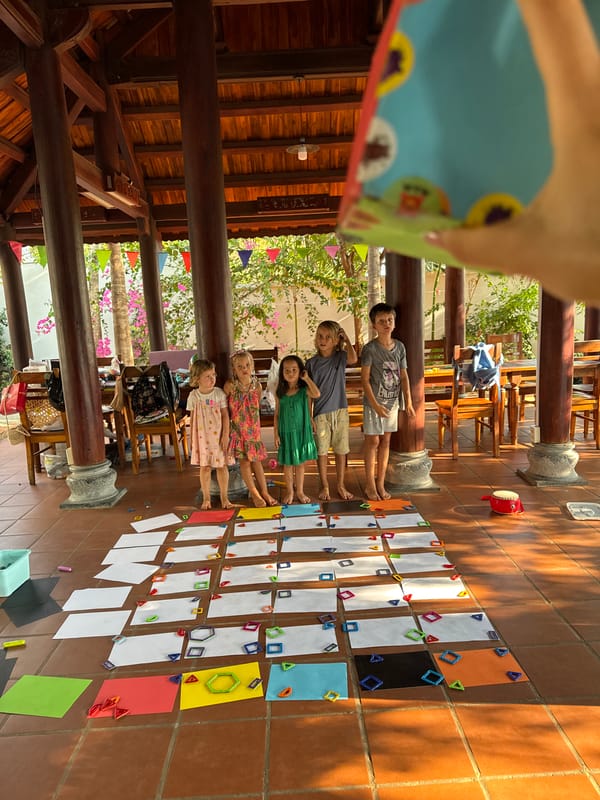 Children participate in educational grid activity in Mũi Né