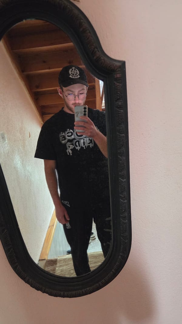 Man takes selfie in mirror in Bania, Bulgaria