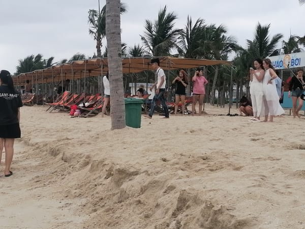 Beach construction activity continues amid leisure activities in Vietnam