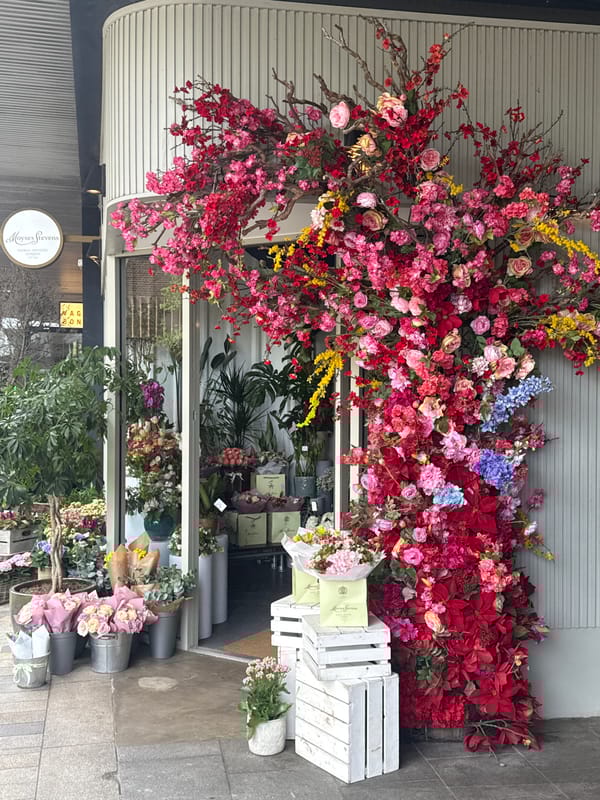 London witness captures flower shop, interior signage, abstract sculpture