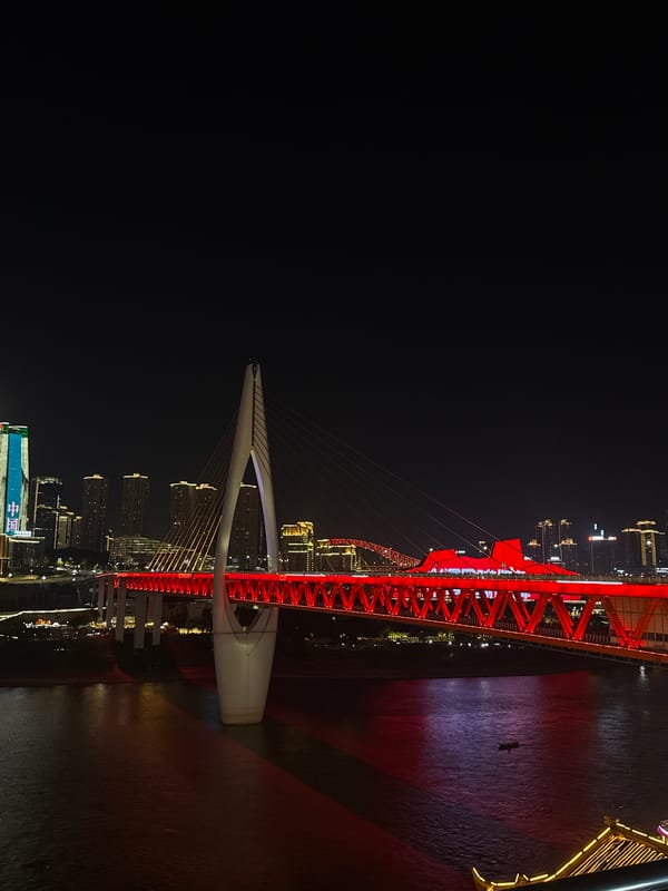 Evening tourism captured in Chongqing's illuminated Yuzhong District