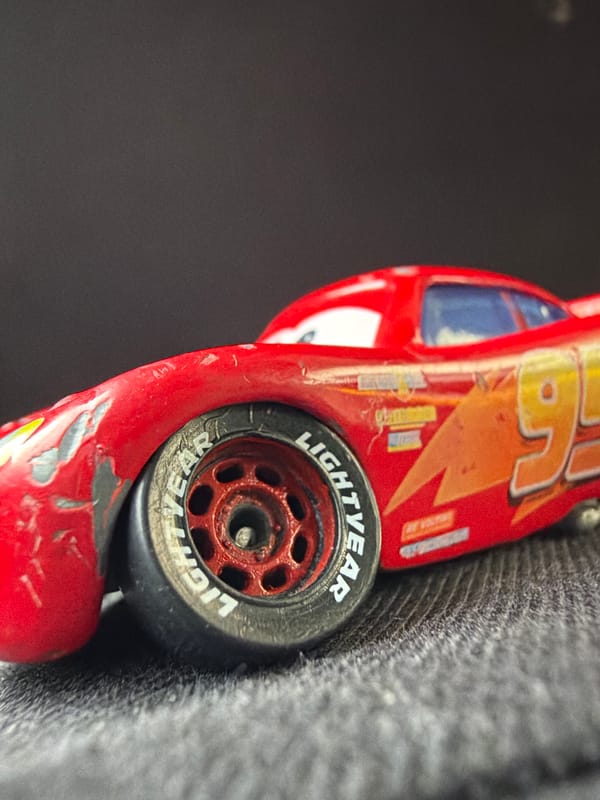 Worn Lightning McQueen toy photographed in Russian village
