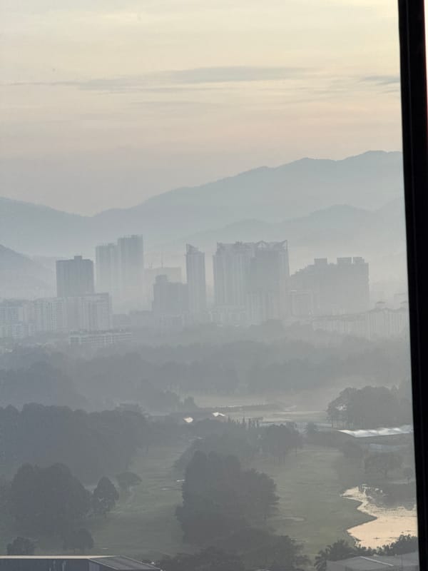 Hazy evening view captured of Kuala Lumpur skyline