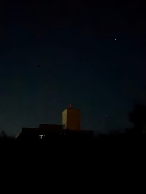 Sunset to starlight over Leudelange rooftops, Luxembourg