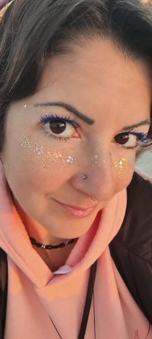 Woman documents beach day in Nahariyya with selfies and sunset