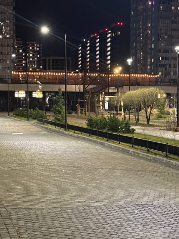 Evening walkway scene captured in Murino, Russia