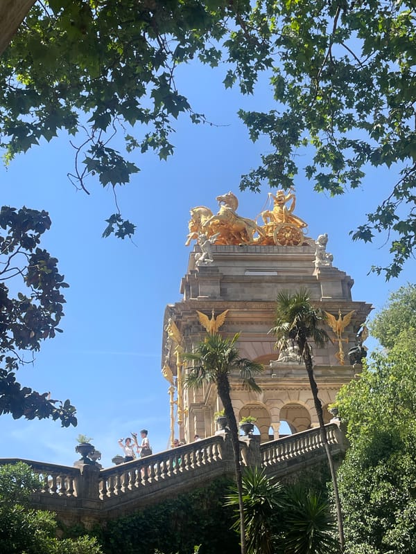 Visitor with flowers spotted at Barcelona's Ciutadella Park fountain