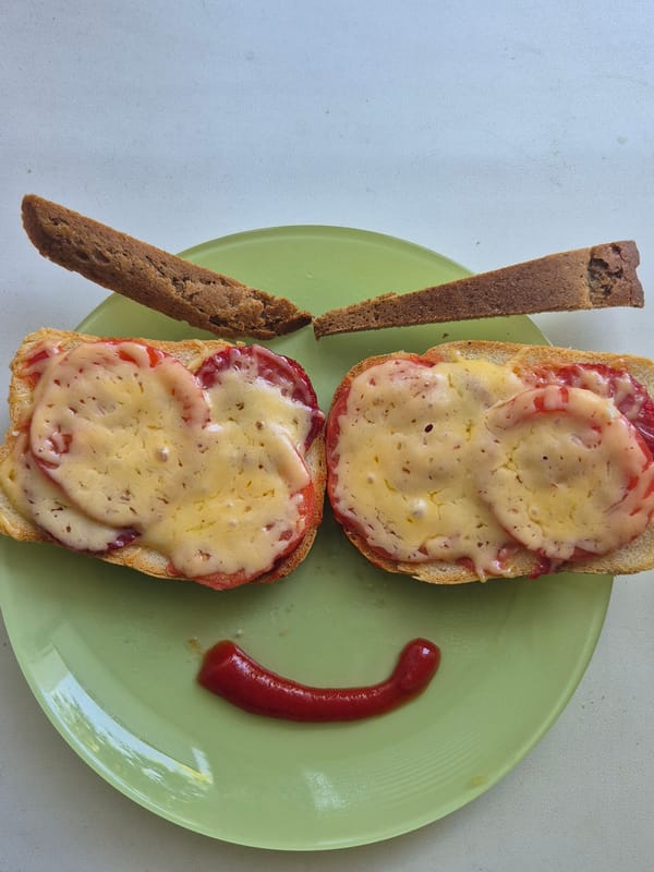 Morning meal documented in Kokshetau features cheese tomato sandwiches