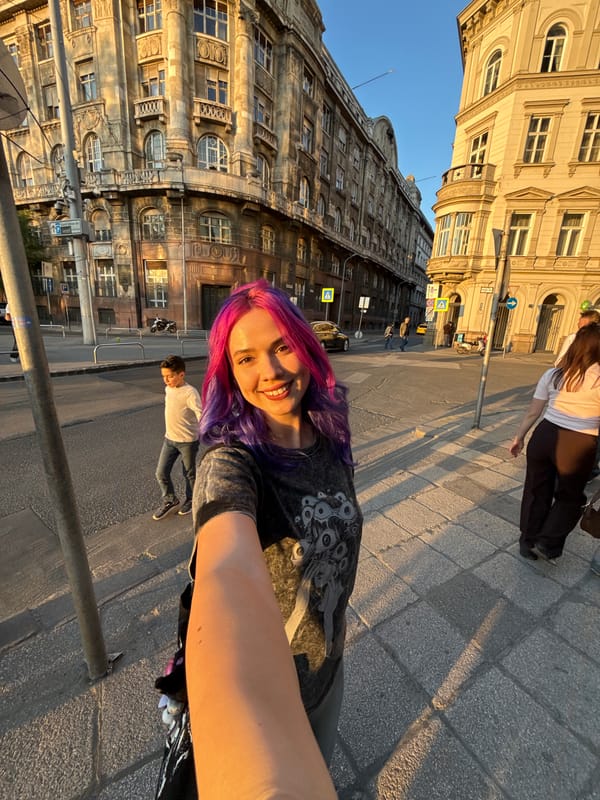 Woman documents sunset photo session in Budapest streets
