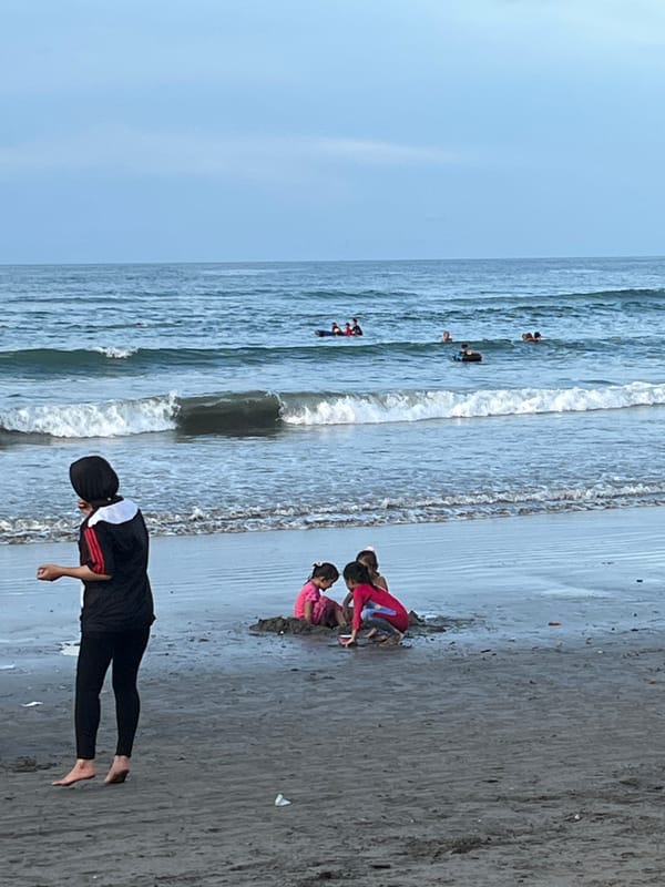 Families enjoy beach day in Lhokseumawe, Indonesia