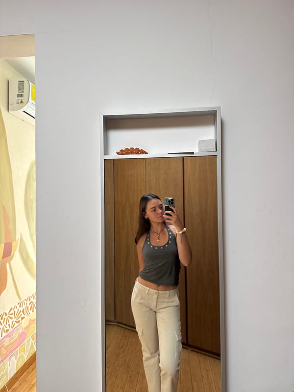Woman takes mirror selfies in Mexican home evening