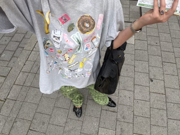 Person in money-patterned pants spotted on Seoul sidewalk