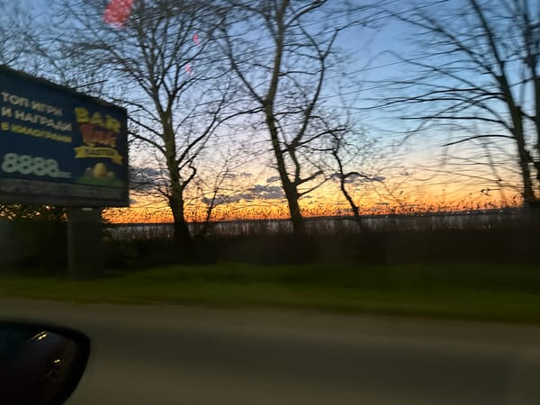 Vehicle passenger captures sunset/sunrise view in Burgas, Bulgaria