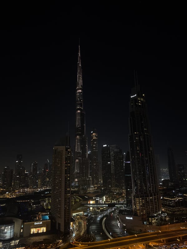 Nighttime Dubai skyline documented from multiple angles