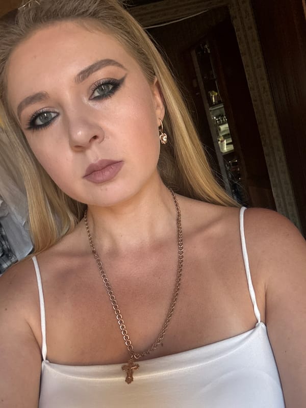 Multiple selfie takes, same look, bedroom setting in Makiivka