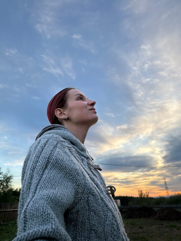 Woman spends quiet evening moments outdoors in Chaikovsky, Russia