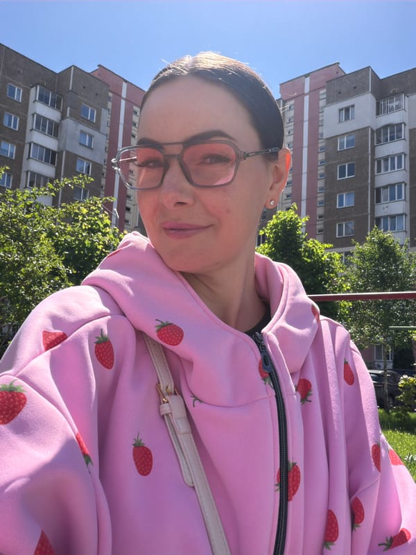 Woman in strawberry hoodie spotted in urban park area