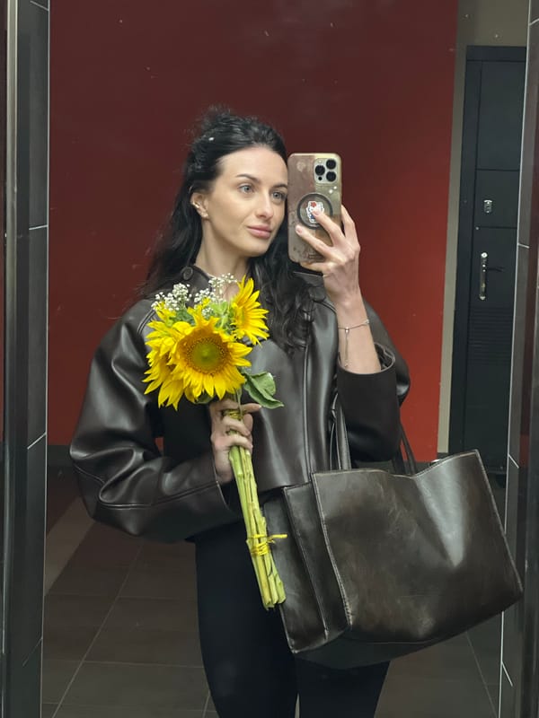 Mirror selfie with sunflowers in Lviv