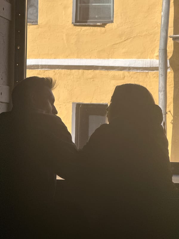 Two figures spotted near window in Moscow building