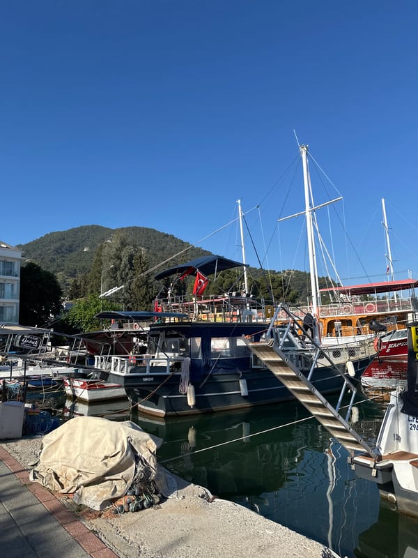 Clear skies over Fethiye marina as boats dock peacefully