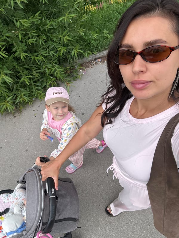 Casual morning out near a Perm café with a stroller in tow
