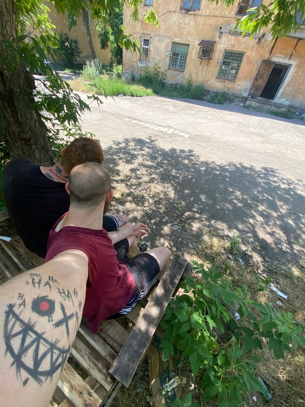 Hanging out at a rundown outdoor spot, selfies and all