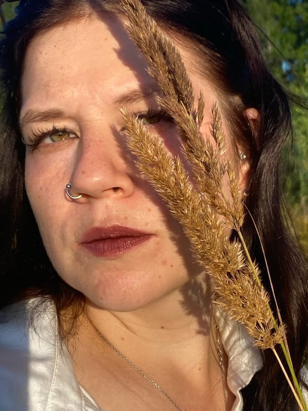 Portrait session in a sunlit grass field, Berkuty, Russia