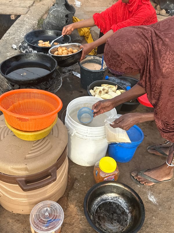 Street vendor prepares traditional Puff Puff in Jos, Nigeria