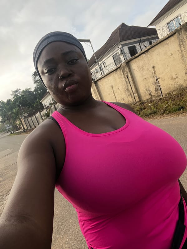 Morning street life in a residential Abuja neighborhood